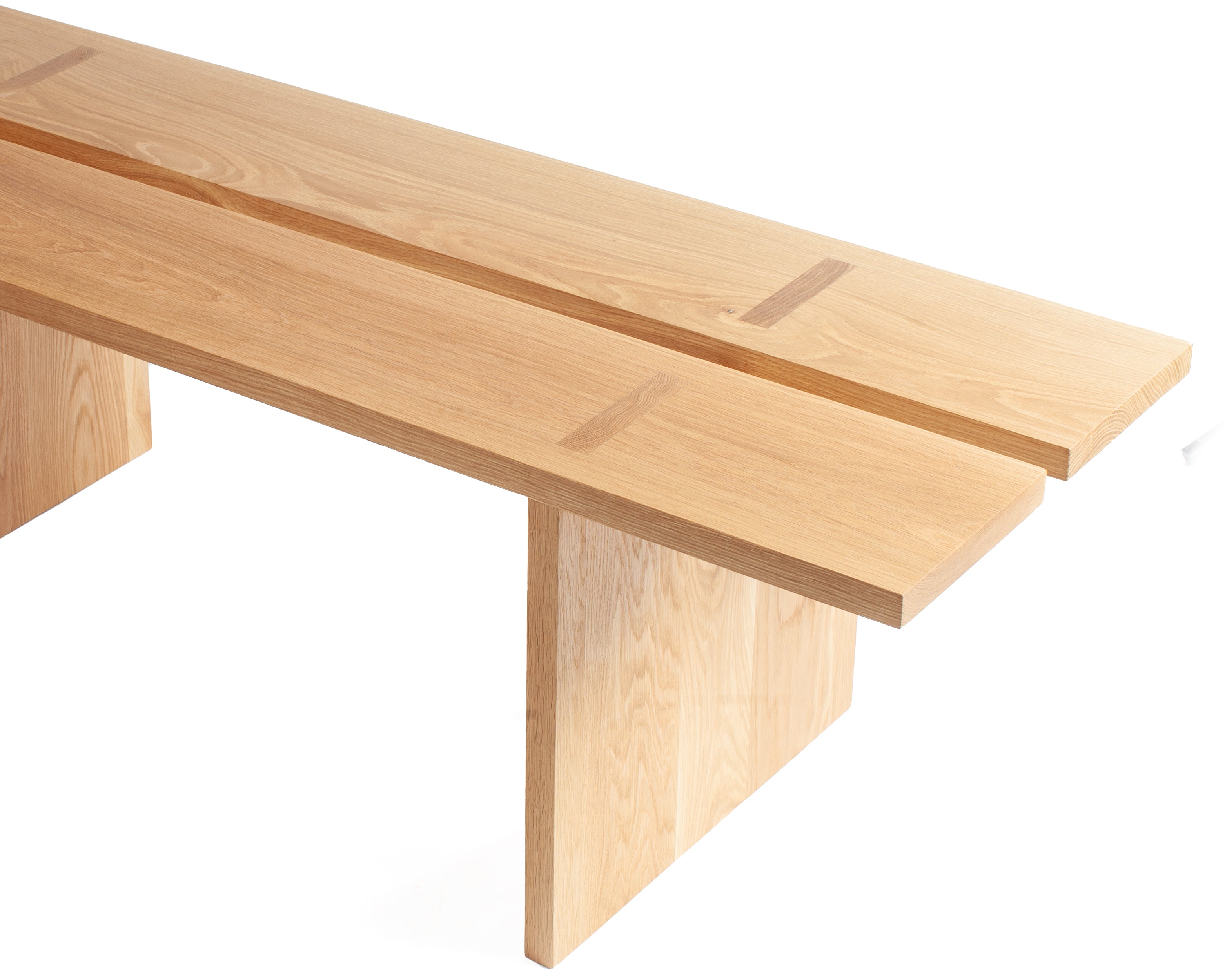 Solid white oak bench with central gap detail on white background