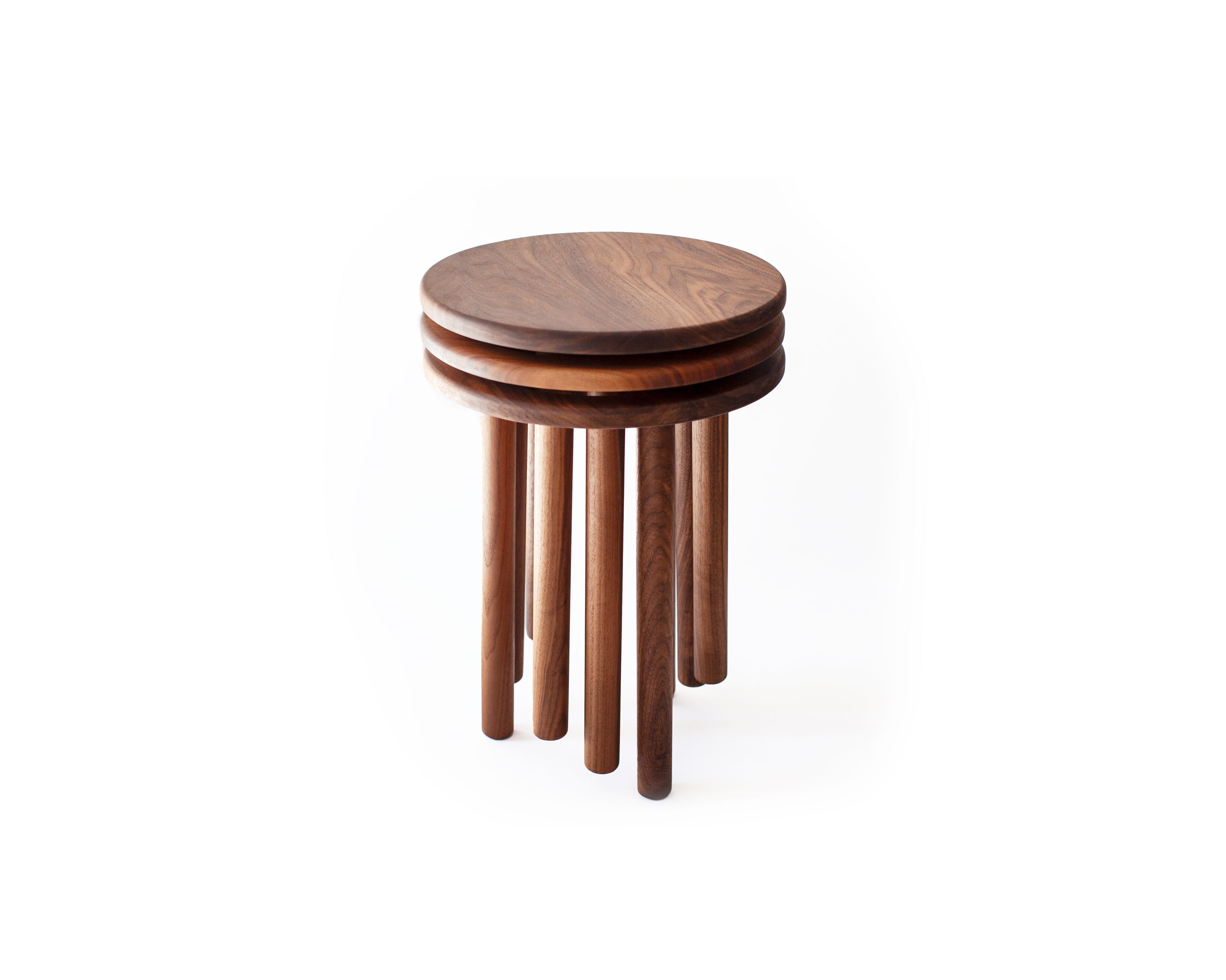 stackable stools in walnut on white back ground